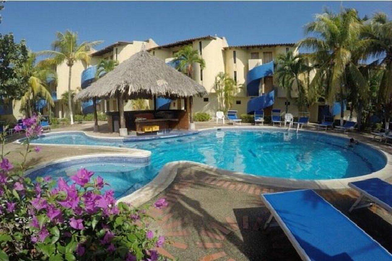 Hotel Golden Paradise Playa El Agua Bagian luar foto