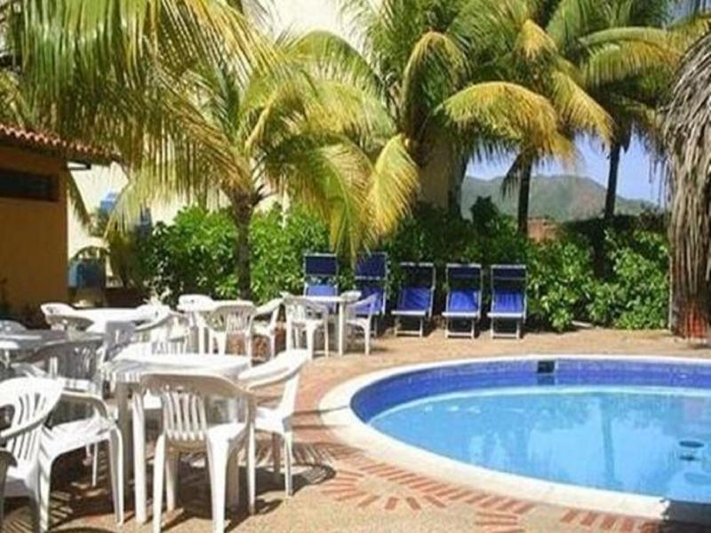 Hotel Golden Paradise Playa El Agua Bagian luar foto