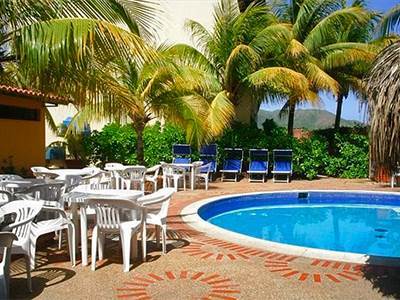 Hotel Golden Paradise Playa El Agua Bagian luar foto